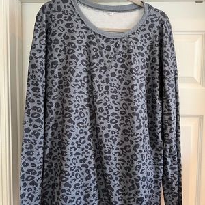 Tunic Boutique leopard print sweater. Very soft.